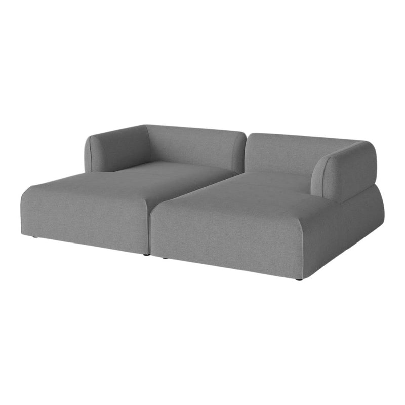 Gray modular sofa with smooth fabric and contemporary design, featuring a minimalist aesthetic and no visible patterns.