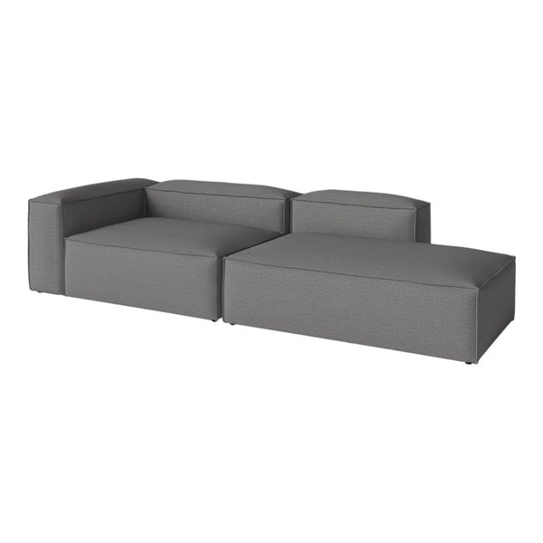 Modern gray sectional sofa in a sleek, minimalist design with clean lines and a textured fabric finish.