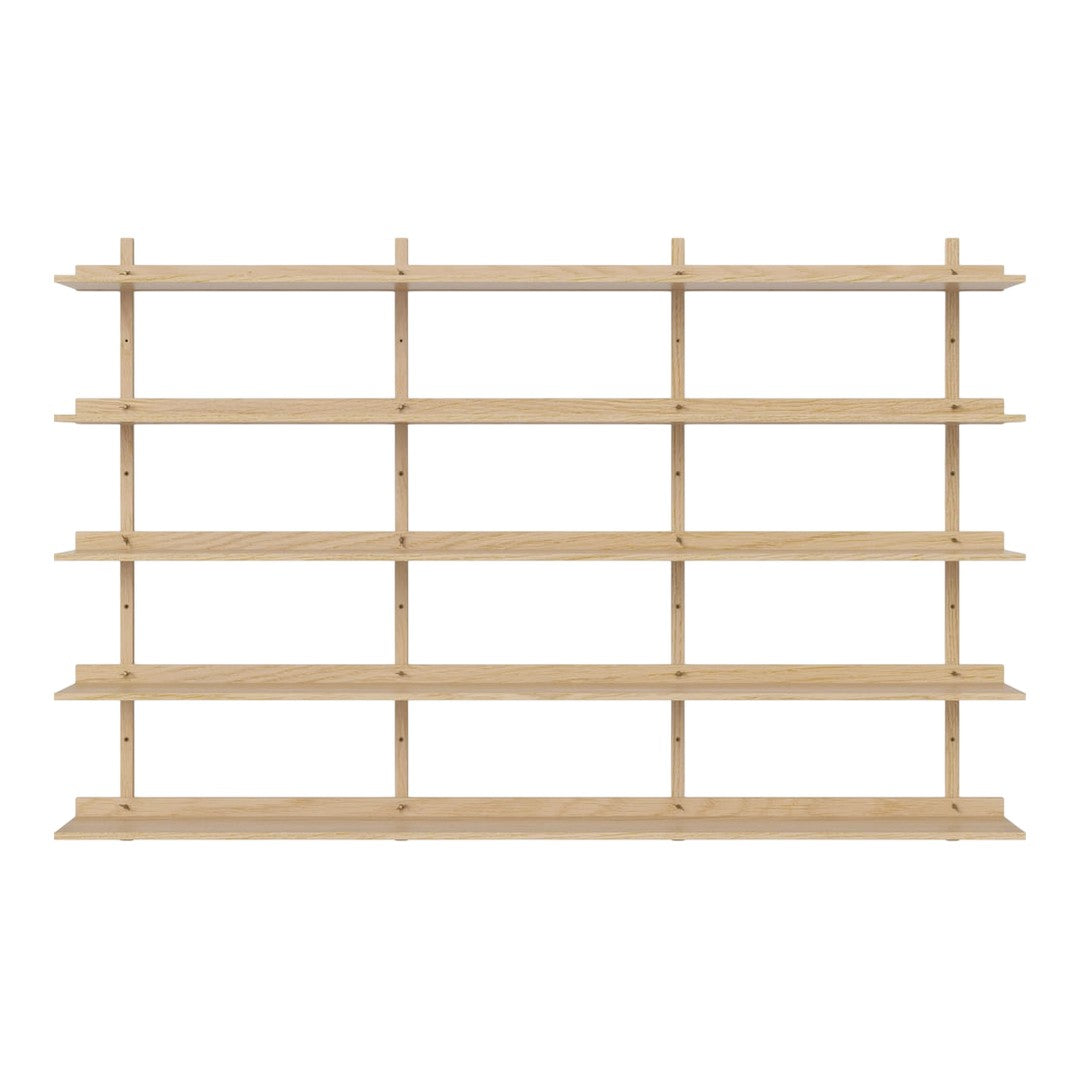 Light wooden shelving unit with a minimalist design, featuring multiple horizontal shelves arranged in a repeating pattern.