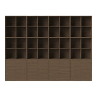 Dark wood bookshelf with a smooth finish, featuring a grid pattern of open and closed cubbies.
