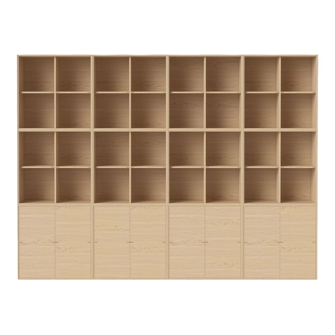 Light wood shelving unit with 20 square compartments and 6 cabinet doors in a natural finish. Perfect for organized storage.