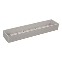 Light gray rectangular organizer with a smooth matte finish and subtle grooves, perfect for minimalist decor.