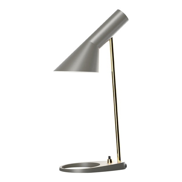 Sleek gray desk lamp with a gold metal accent and minimalist design, perfect for modern interiors.