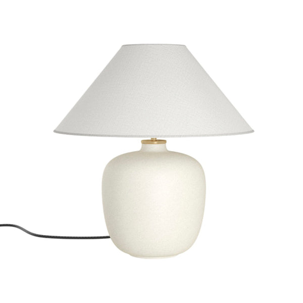 White ceramic lamp with a classic white shade and smooth, rounded base design. Elegant and minimalist style.