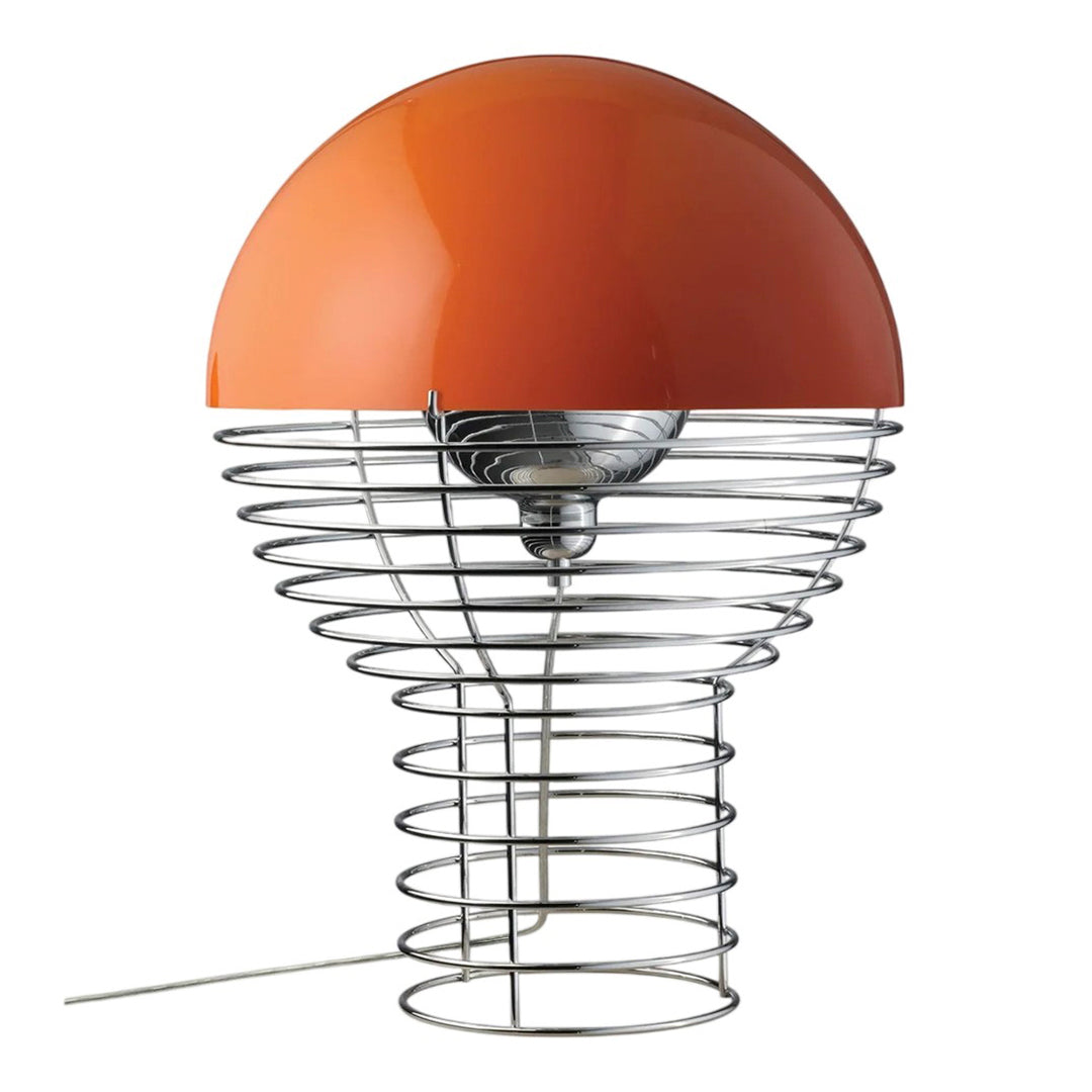 Orange dome lamp with a chrome spiral base, combining modern design with vibrant color and playful patterns.