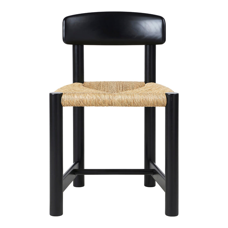 Black wooden chair with a natural woven seat, showcasing a sleek modern design and earthy tones.