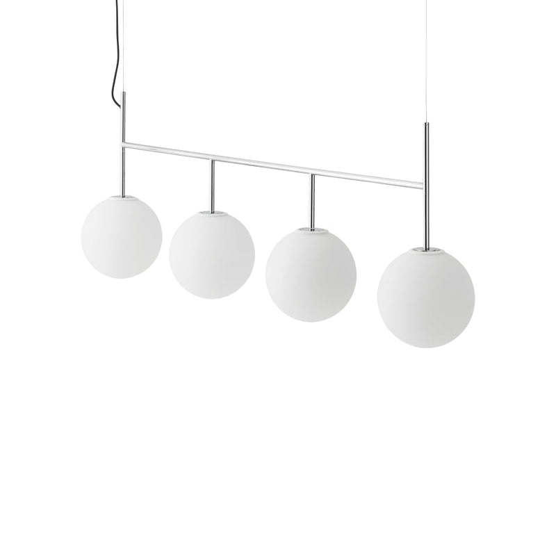 White frosted glass globes on a sleek chrome pendant light, creating a modern and minimalist aesthetic.