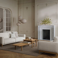 Elegant beige and white living room featuring soft textures and natural wood accents, with subtle geometric patterns.