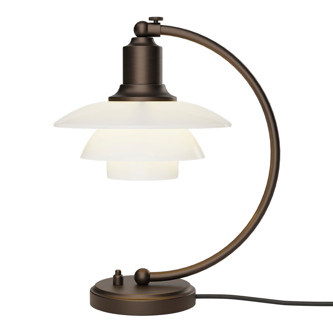 Bronze desk lamp with a sleek, curved design and layered white glass shades. Modern, minimalist style.