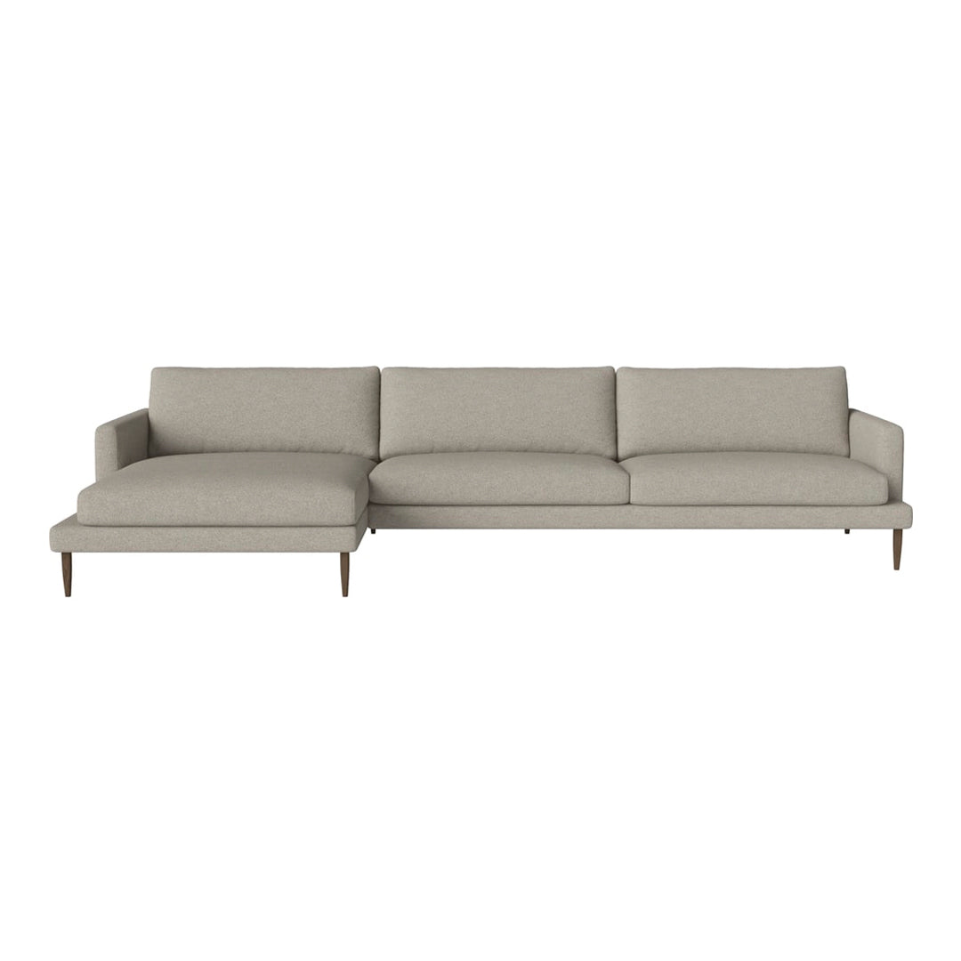 Light gray sectional sofa with smooth fabric and clean lines for modern decor. Ideal for living rooms or lounging areas.