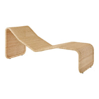 Natural woven lounge chair in a smooth, curved design featuring a light beige color and textured pattern.