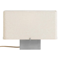 Beige fabric lamp shade with a sleek metallic base, featuring a minimalist design and neutral tones.