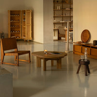 "Warm wooden furniture with minimalist design, featuring natural tones and smooth, sleek surfaces."