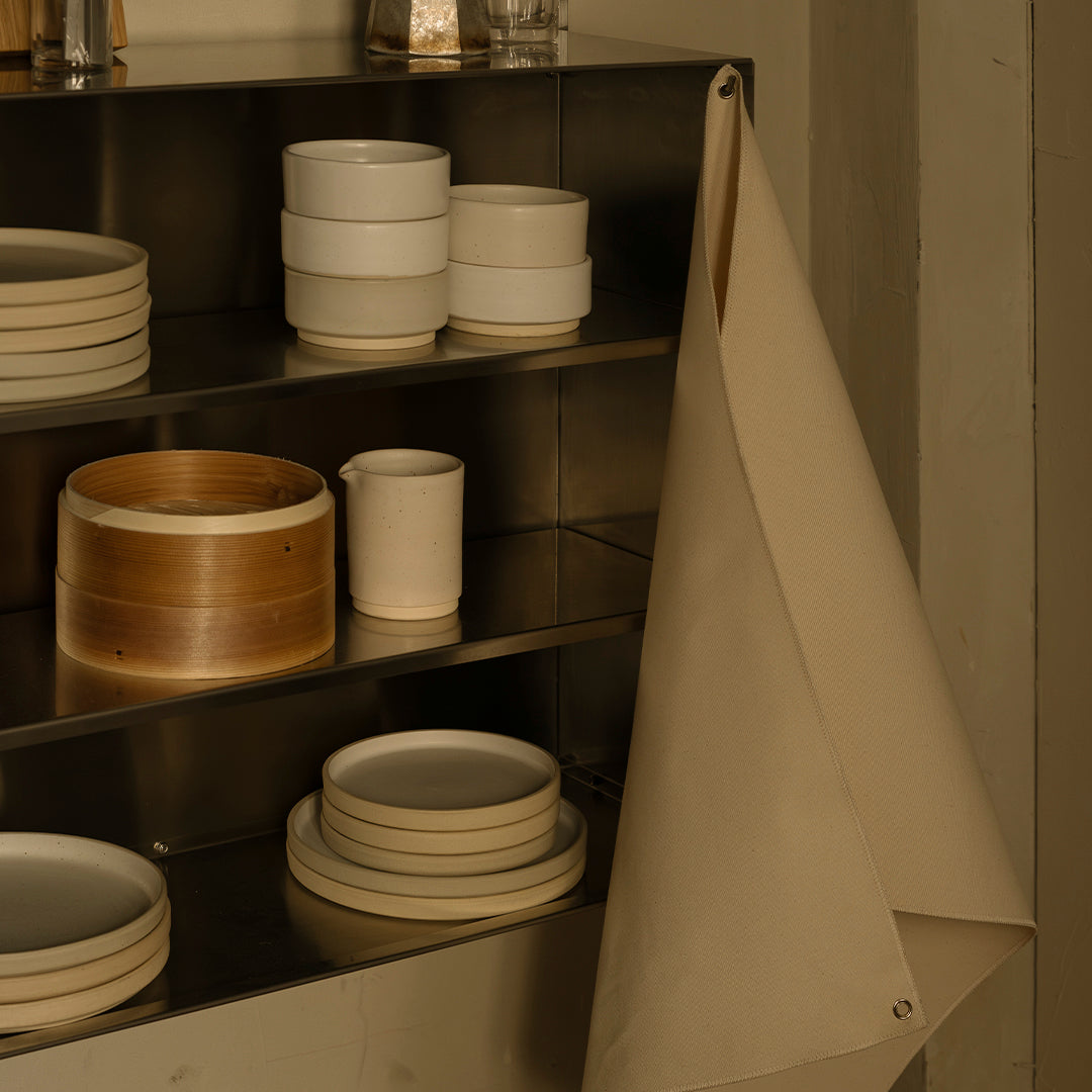 Neutral-toned kitchenware with creamy whites and soft beige, showcasing minimalist elegance and natural textures.
