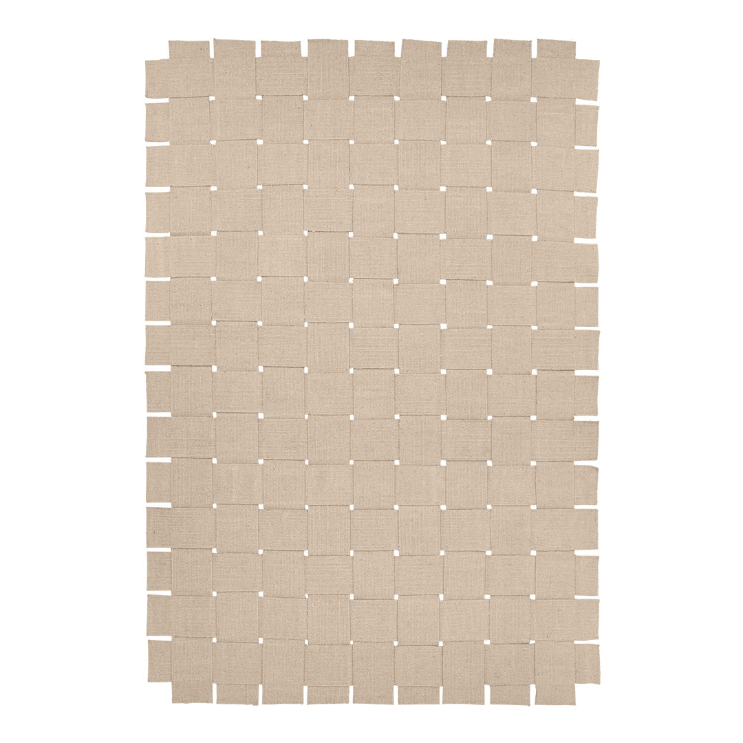 Beige woven rug with a square pattern, featuring unique cut-out designs for a textured look. Perfect for stylish decor.