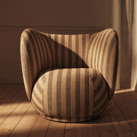 Striped beige armchair with a rounded shape, featuring subtle brown tones and a cozy texture. Perfect for modern decor.