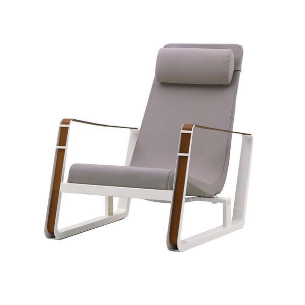 Modern gray lounge chair with sleek white and wood accents, featuring a minimalist design and clean lines.