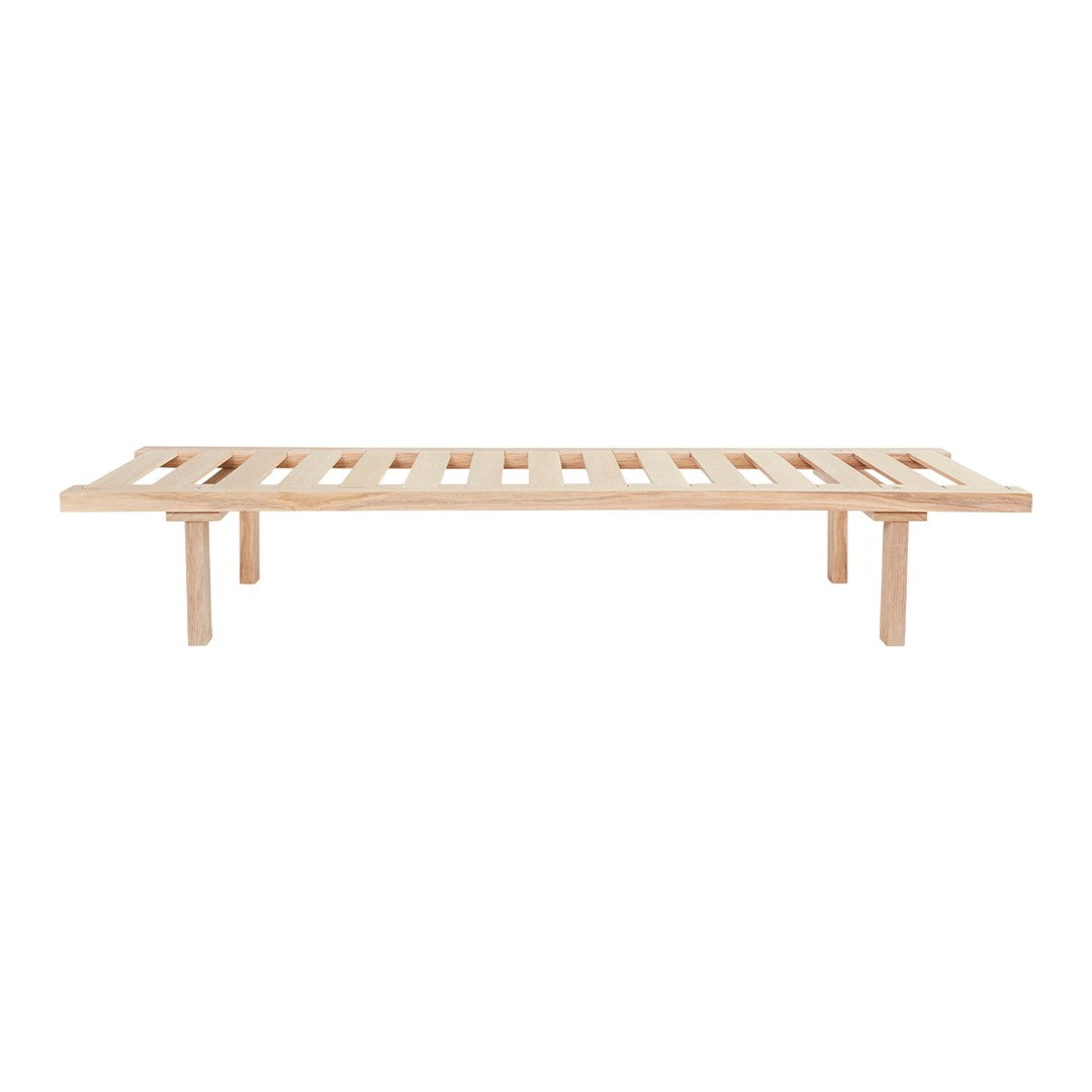 Natural wood slatted bed frame in light beige with a simple, minimalist design.