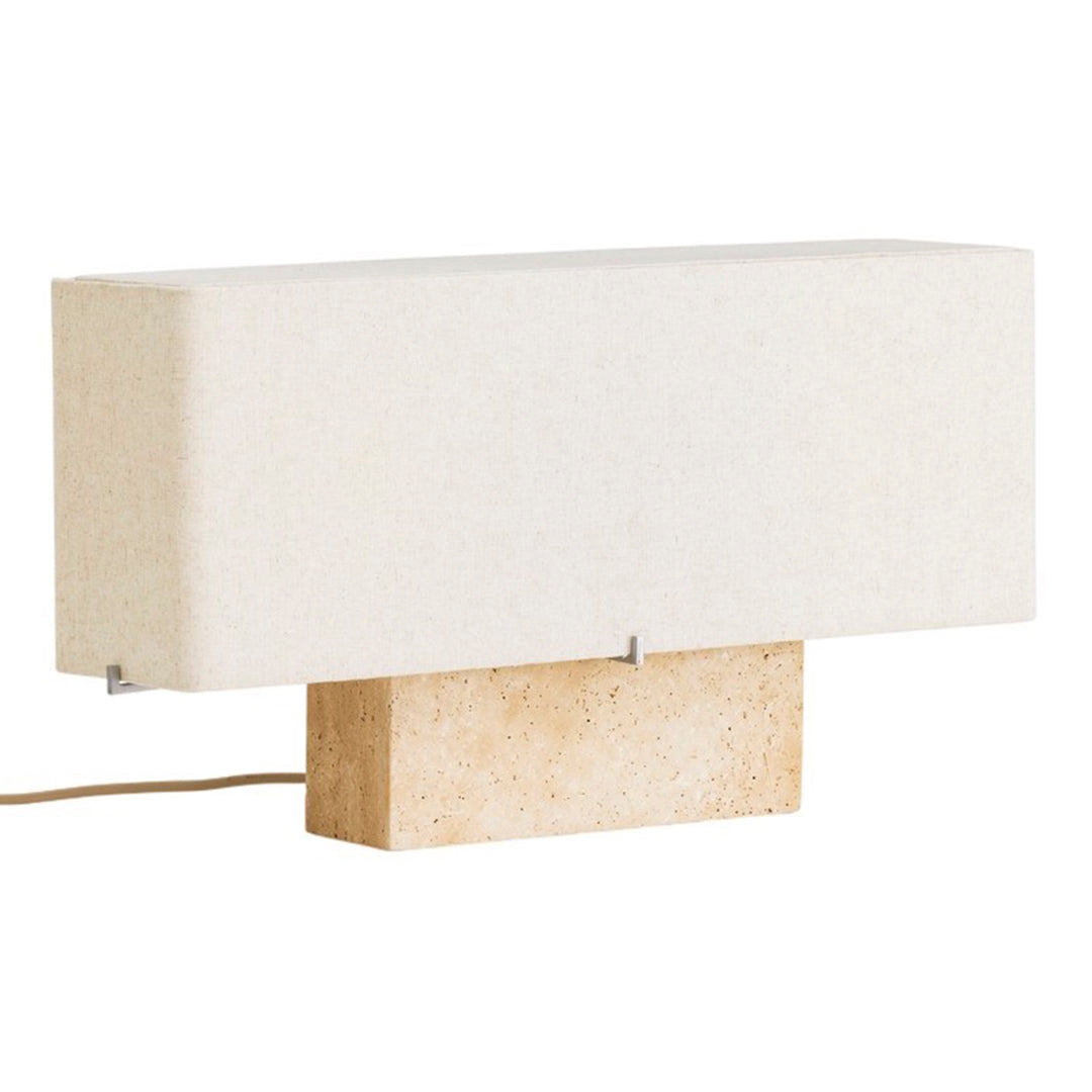 Cream rectangular lamp shade on a textured beige base, offering a minimalist and modern design.