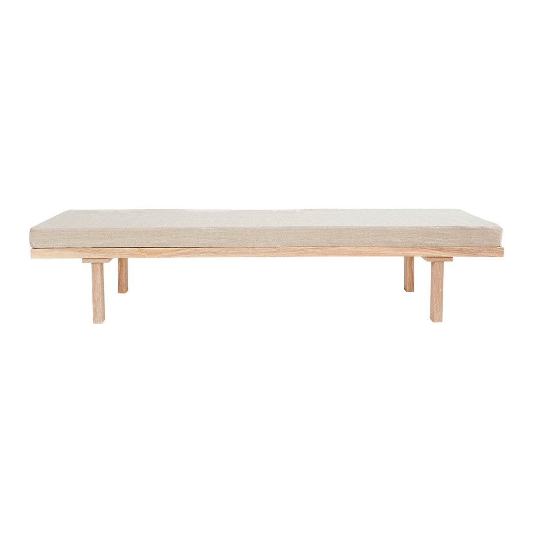 Light wood coffee table with a smooth, natural finish and minimalist design, featuring clean lines and a simple aesthetic.