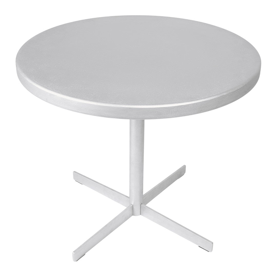 Round silver table with a smooth surface and minimalist cross base. Perfect for modern decor.