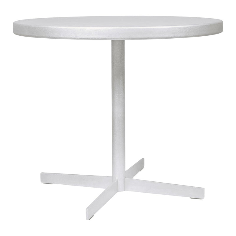 White round table with a smooth surface and a sleek silver base, perfect for modern decor.