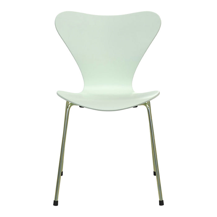Modern white chair with a sleek design and metallic legs, highlighting minimalist style and clean lines.