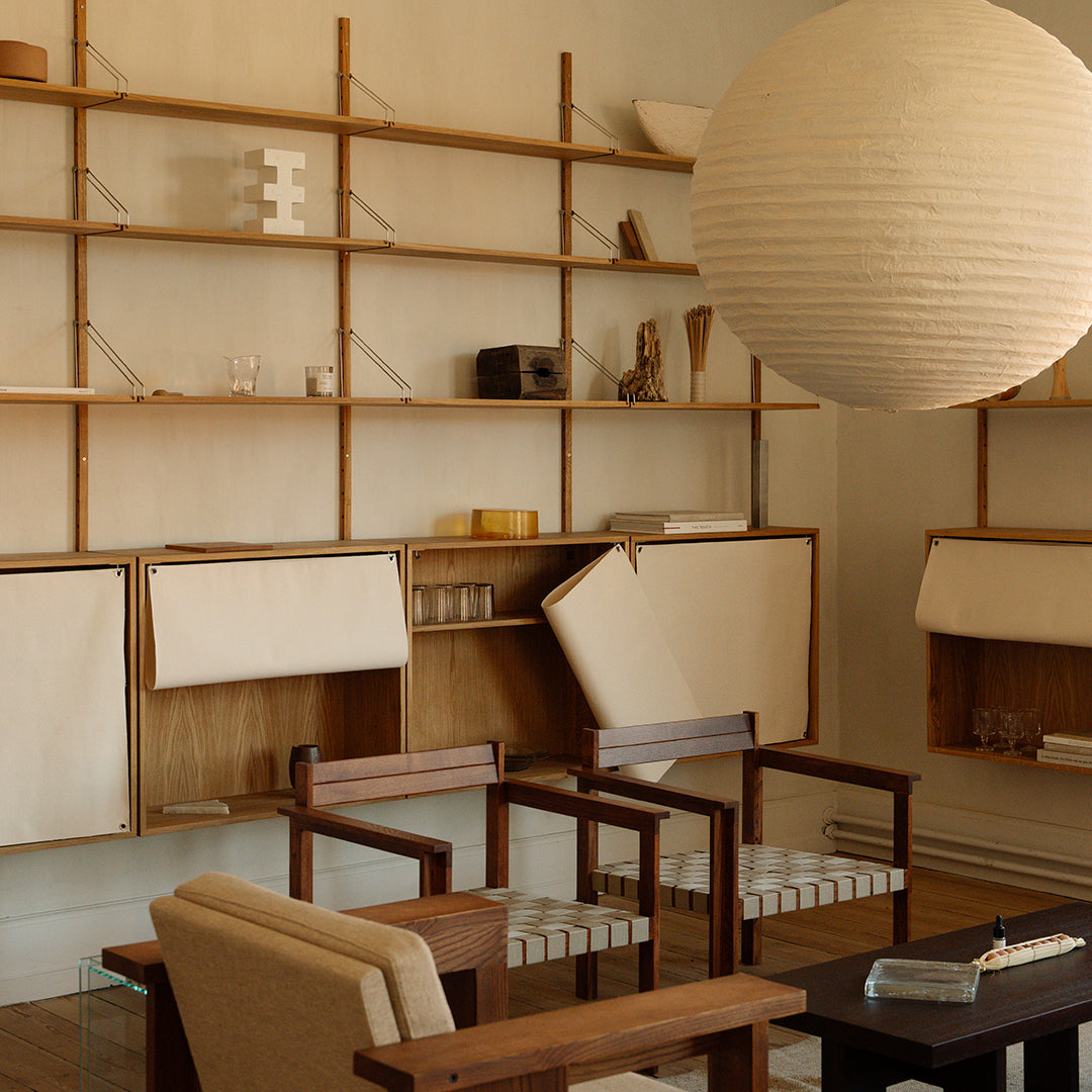 "Modern neutral tones with light wooden furniture and soft beige accents create a cozy and stylish interior space."