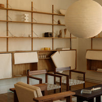 "Modern neutral tones with light wooden furniture and soft beige accents create a cozy and stylish interior space."