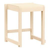 Simple wooden stool in natural cream color with minimalist design and smooth, unadorned surface. Perfect for any decor.