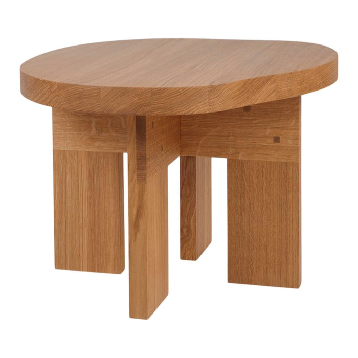 Round wooden table in a natural oak finish with a smooth, light grain pattern and clean, modern lines.