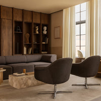 Modern living room with gray upholstery, warm wood tones, and neutral curtains, featuring a marble coffee table.