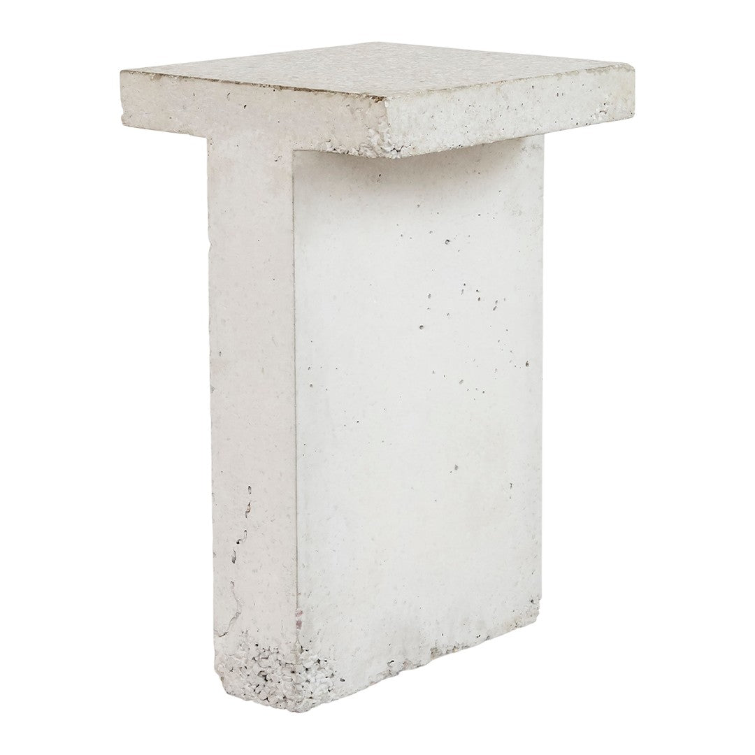 White concrete accent table with a minimalist design and smooth surface. Ideal for modern decor.