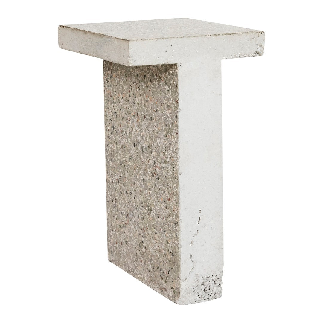 White concrete table with a textured gray and beige patterned base, perfect for modern decor.