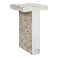 White concrete table with a textured gray and beige patterned base, perfect for modern decor.