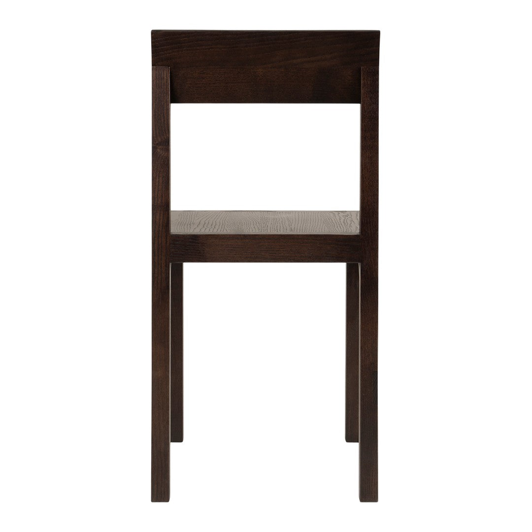 Dark brown wood chair with a simple, minimalist design and a light, neutral fabric seat.