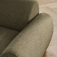 Textured olive green fabric with a subtle pattern, showcasing understated elegance and modern design.