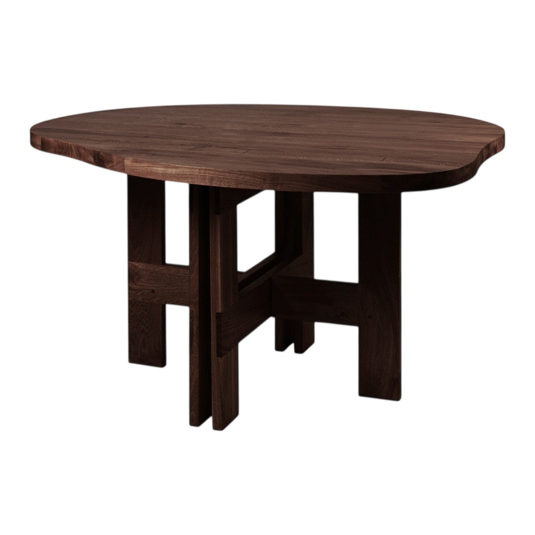 Round dark walnut table with a smooth surface and minimalist design. Ideal for modern dining spaces.