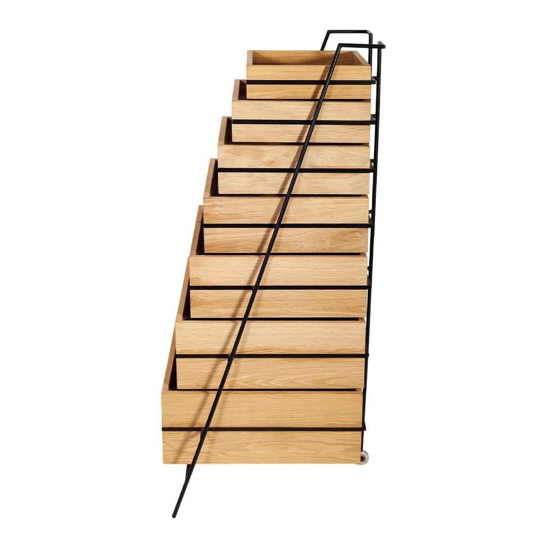 Wooden display rack with natural wood finish and black metal accents, featuring a slanted design with multiple shelves.