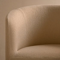 Beige textured upholstery with a subtle woven pattern, adding elegance and warmth to any space.