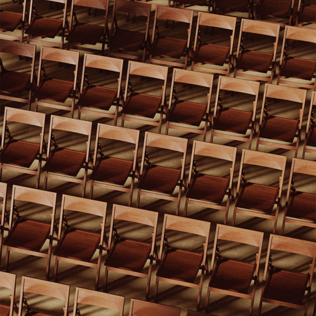 Repetitive pattern of wooden chair silhouettes in warm brown tones, creating a rich textured effect.