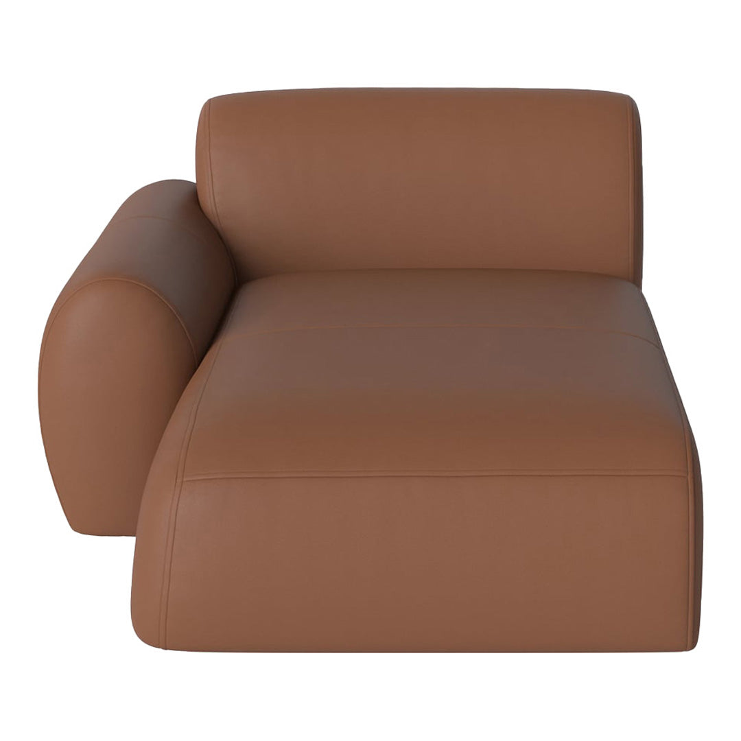 Brown leather chaise lounge with smooth, minimalist design. Perfect for modern and contemporary interiors.