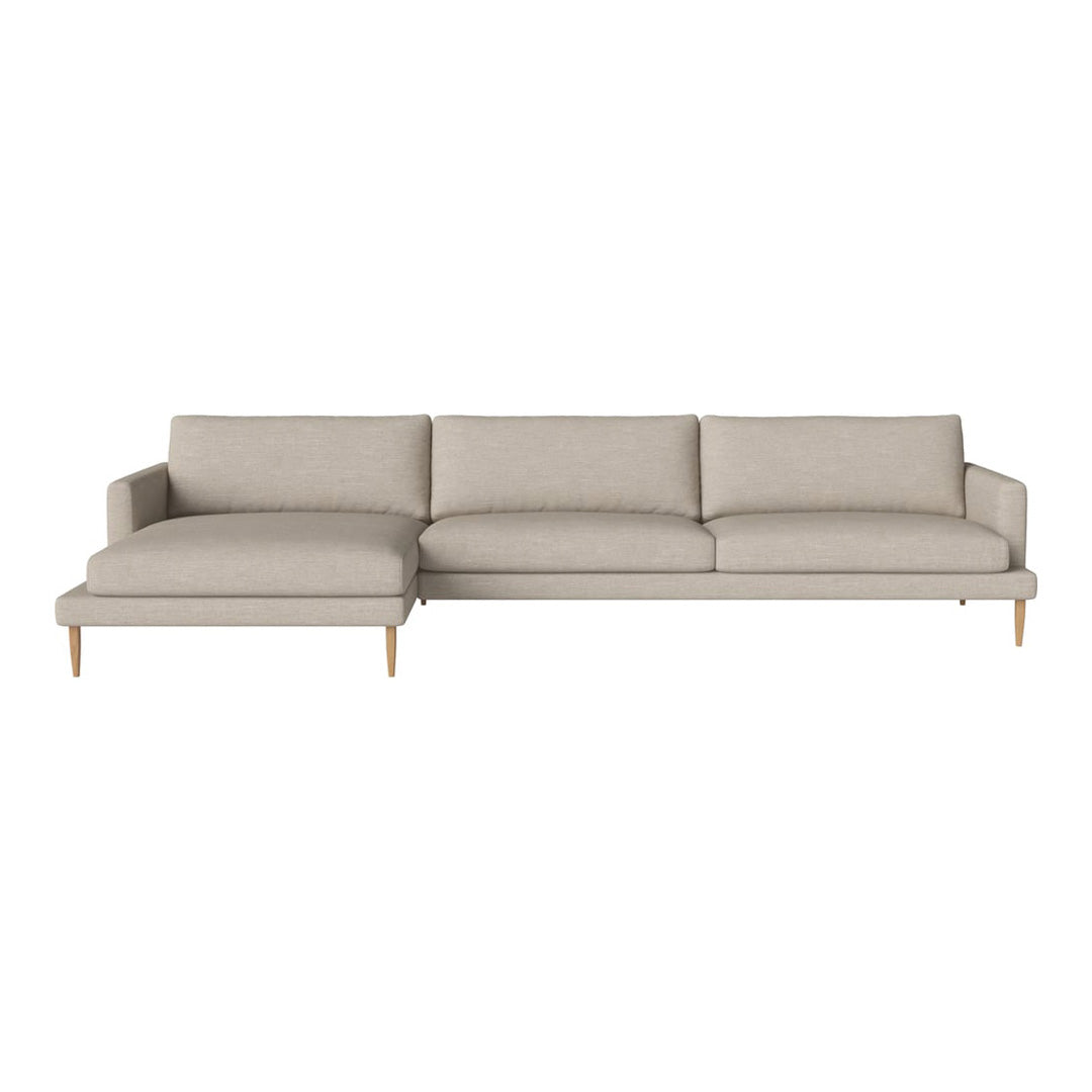 Light beige modern sectional sofa with clean lines and a smooth fabric finish, featuring minimalist wooden legs.