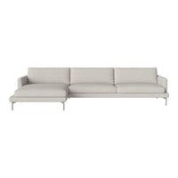 Light gray sectional sofa with clean lines and minimalistic design, featuring a smooth fabric texture.