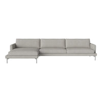 Modern gray sectional sofa with minimalist design and smooth fabric upholstery, perfect for contemporary décor.