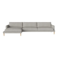 Light gray modern sectional sofa with simple lines and soft fabric, featuring a minimalist design and wooden legs.