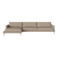 Light beige sectional sofa with a smooth fabric finish and sleek silver legs, perfect for modern minimalist decor.