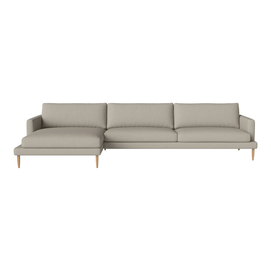Light gray sectional sofa with smooth fabric and wooden legs, perfect for modern living spaces.