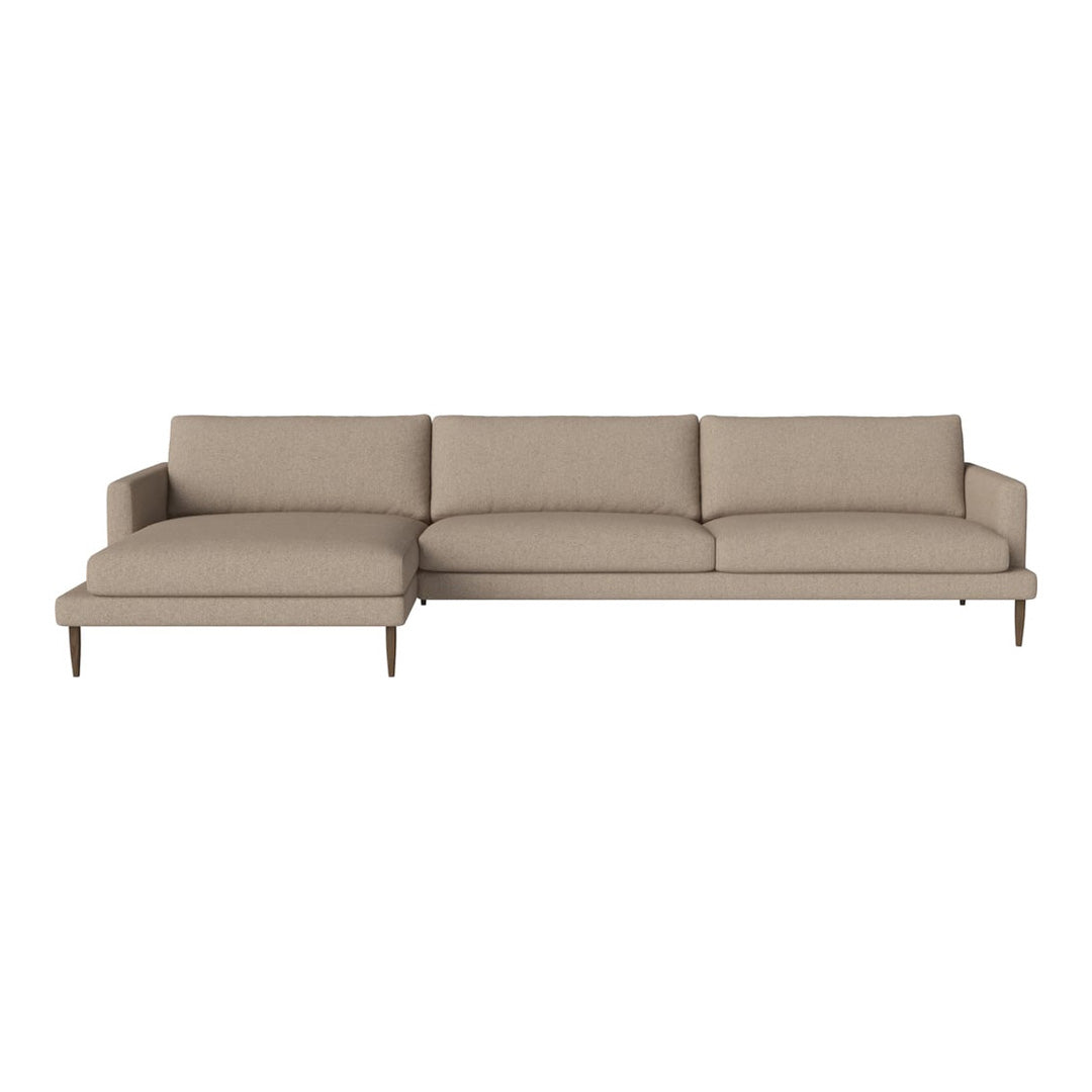 Beige sectional sofa with a smooth fabric surface and minimalist design, featuring a simple, uniform pattern.