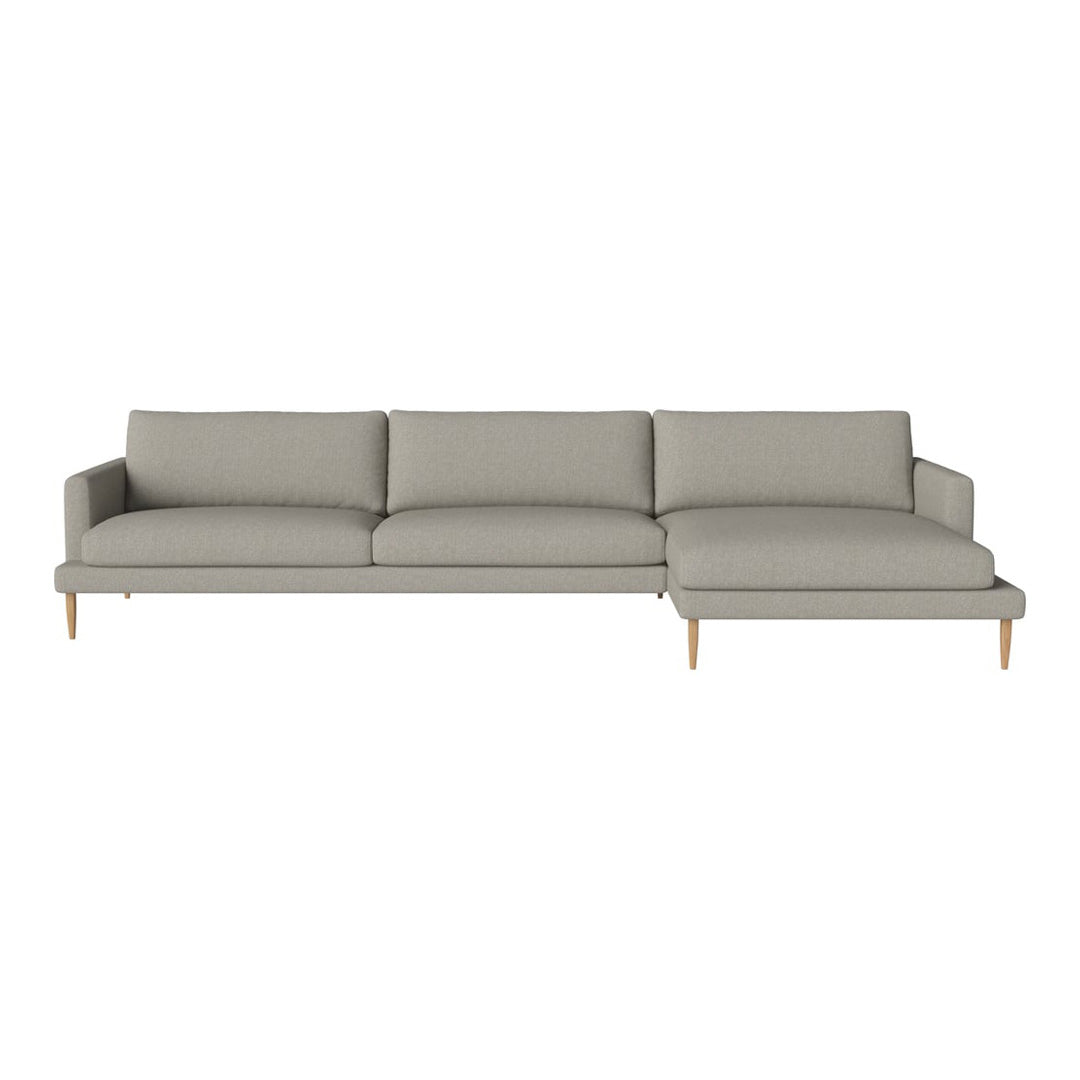 Light grey modern sectional sofa with clean lines and minimalist design, featuring subtle textured upholstery.